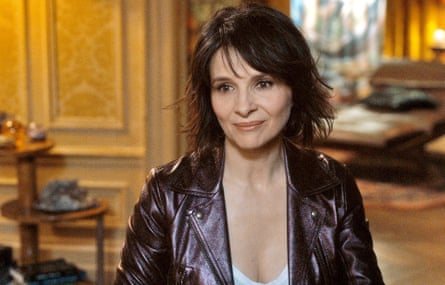 Woman wearing leather jacket smiles