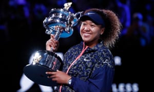 Naomi Osaka with the Daphne Akhurst Memorial Cup after her straight-sets win against Jennifer Brady, who was in her first slam final.