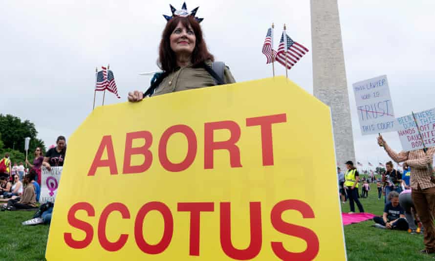Abortion rights activist rally at the Washington Monument before a march to the US Supreme Court in Washington, DC, May 14, 2022.