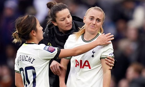 Tottenham Hotspur's Molly Bartrip is comforted.