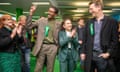 Carla Denyer, the co-leader of the Green Party (centre right) celebrates with councillors Guy Poultney (right) and Mohamed Makawi