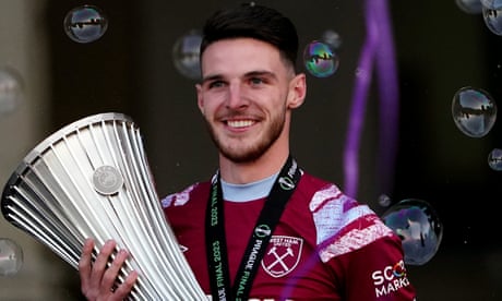 West Ham's Declan Rice celebrates with the Europa Conference League trophy at the Old Town Hall in Stratford.