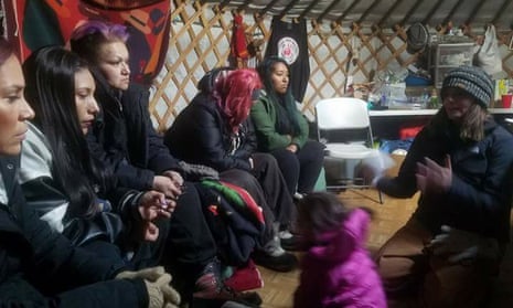 Alisha Custer – whose lineage traces back to the US army commander who led the 19th century wars against Lakota Sioux and Cheyenne warriors – meets with Standing Rock members.