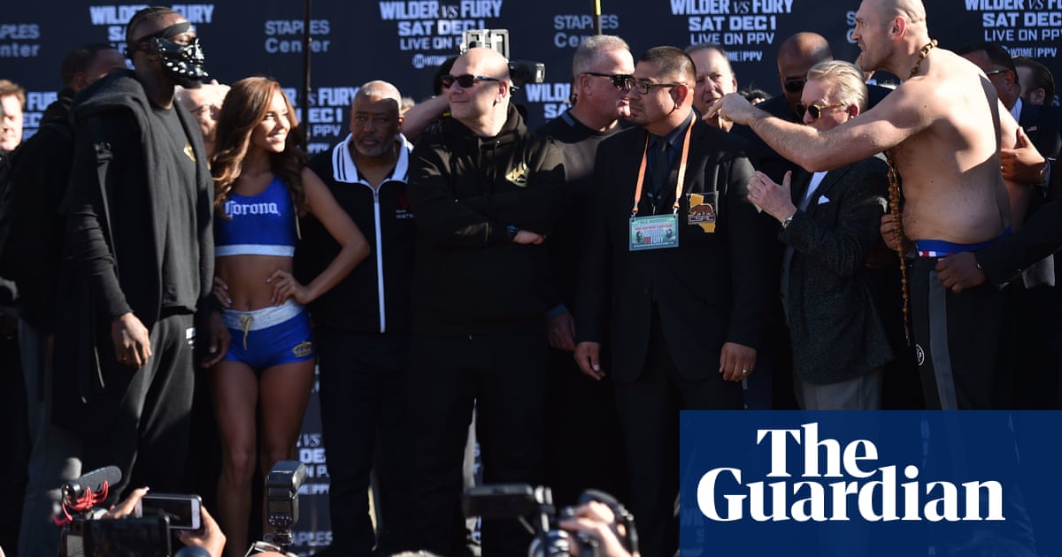 tyson fury  deontay wilder weigh   heavyweight title fight