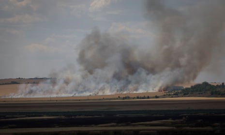 A wheat field burns after shelling, amid Russia’s attack, in the Donetsk region, Ukraine.