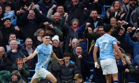 Manchester City’s Phil Foden celebrates scoring their first goal
