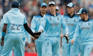 Jos Buttler and the England players leave the pitch.