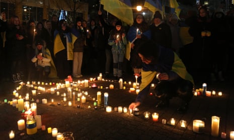 Supporters of Ukraine attend a candlelight vigil in Vancouver.