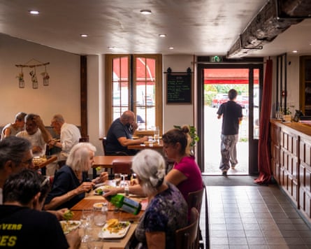 People sitting at Au Bon Accueil restaurant in Saint-Martin-sur-Ouanne in France