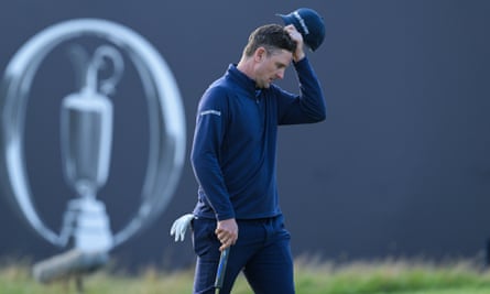 Justin Rose terlihat sedih pada green ke-18 di Royal Liverpool.