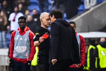 Paulo Fonseca confronts referee Benoît Millot.