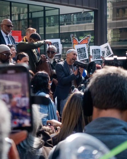 Man speaks into loud hailer