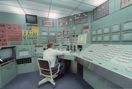 a man sitting down in lab