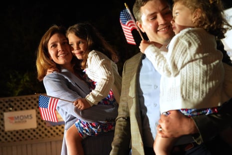 From left, Rebecca Bennett, Democratic candidate for New Jersey's 7th Congressional District, holds her daughter Rosie, alongside her husband Alex Hydrean and daughter Millie during a primary election night watch party after winning the Democratic nomination Tuesday, June 2, 2026, in Bridgewater, N.J.