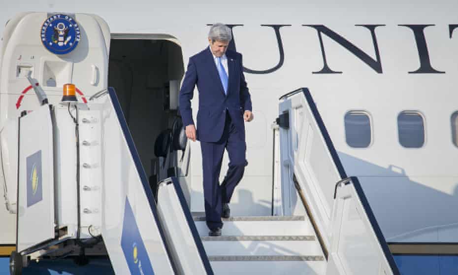 US Secretary of State John Kerry disembarks from his aircraft