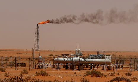 A flame from a Saudi Aramco oil installion known as “Pump 3” is seen in the desert near the oil-rich area of Khouris, 160 kms east of the Saudi capital Riyadh, on June 23, 2008. 