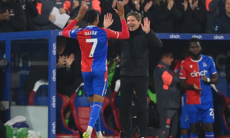 Michael Olise celebrates scoring his team's fourth goal with Oliver Glasner during the Premier League match between Crystal Palace and Manchester United