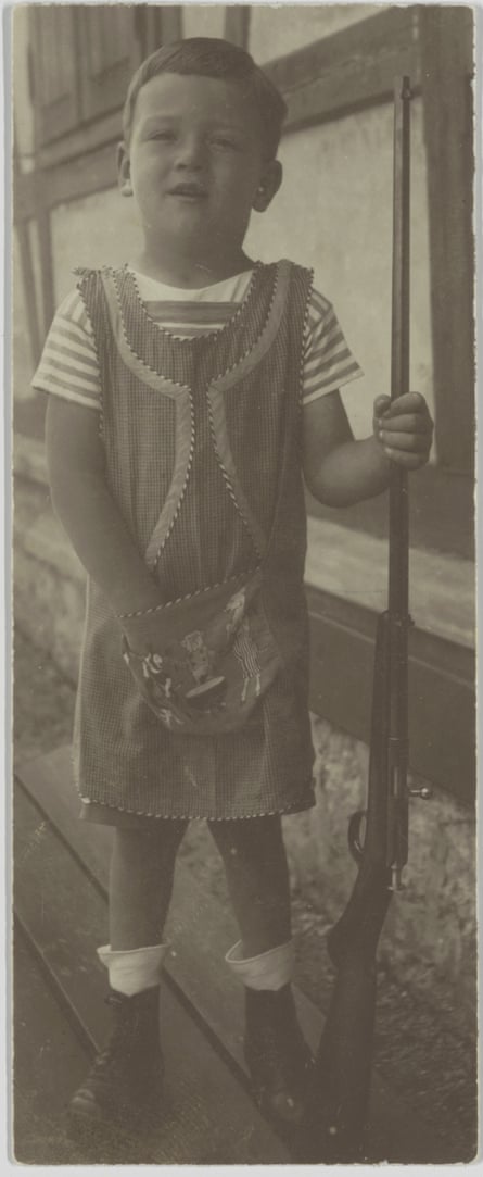 Gerhard Bast, aged 3, with his first ‘real’ gun, a small calibre rifle, in 1914.