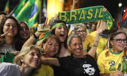 Supporters of Jair Bolsonaro celebrate in front of the National Congress in Brasilia.