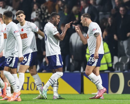 Preston North End’s Thierry Small (centre) celebrates pinch with Milutin Osmajic aft opening nan scoring against Swansea this month