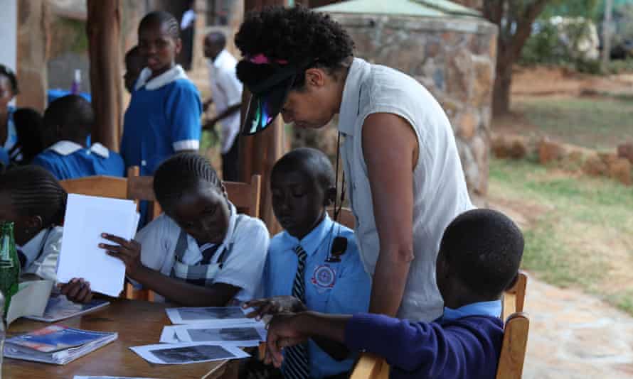 Sorting out the photos at the Kids Twiga Tally. The photo shows Paula Kahumbu with children who participated in the event.