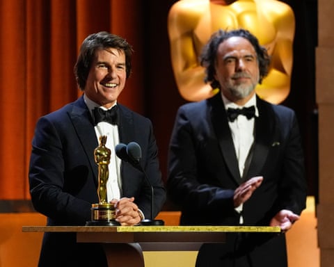 Cruise with Oscar-winning film director Alejandro González Iñárritu, who presented the award.