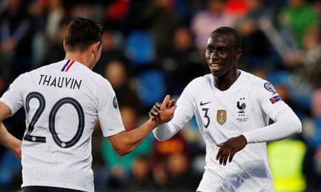 Ferland Mendy (right) congratulates Florian Thauvin on his goal for France in the 4-0 win over Andorra