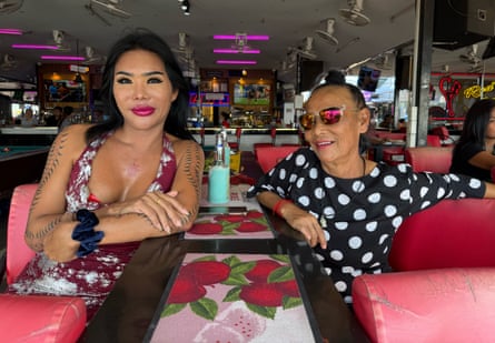 Wittaya Phoobantad, left, and Wanthana Pota, who work at Poker Bar overlooking Pattaya’s beachfront.