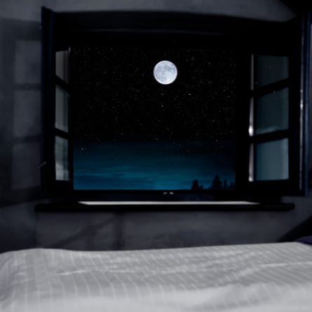 Open window with view to starry sky with full moon