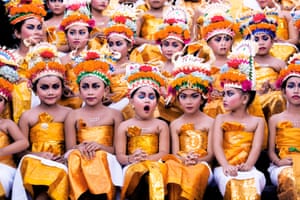 Image was taken in Bali during Melasti Festival. This Festival is conducted once a year in conjunction with Nyepi or Silent Day. These young girls were waiting for their turn to perform. They looked stunning with their bright coloured costumes and heavy make-up on, however the expression on each of the girls’ face especially the yawning girl gives this image an extra ‘ummpph’