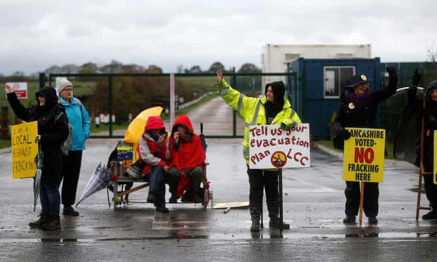 Protesters stand outside Cuadrilla’s Preston New Road fracking site near Blackpool, yesterday.