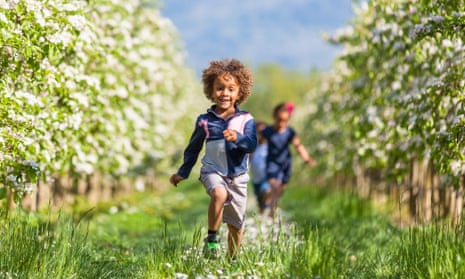 Children running through fields