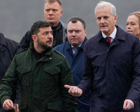Norway's prime minister Jonas Gahr Støre, right, welcomes Ukrainian president Volodymyr Zelenskyy on his arrival at Gardermoen, Norway.