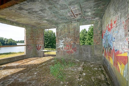 The walls of the control tower are covered in graffiti