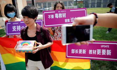 Qiu Bai with gay rights campaigners outside the court in Beijing.
