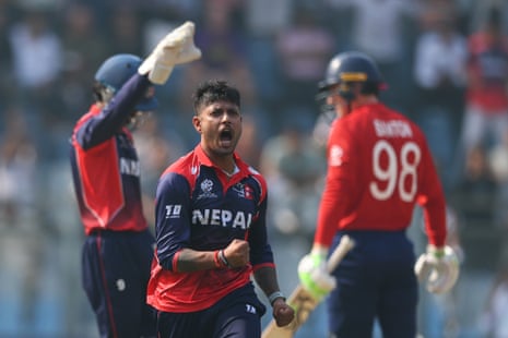 Sandeep Lamichhane celebrates after taking the wicket of Tom Banton.