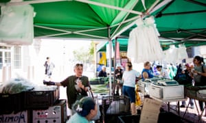 Wendy Ng, 73, at a San Francisco farmers market where she shops with her Snap benefits. Thousands will lose such benefits under a new Trump administration rule.