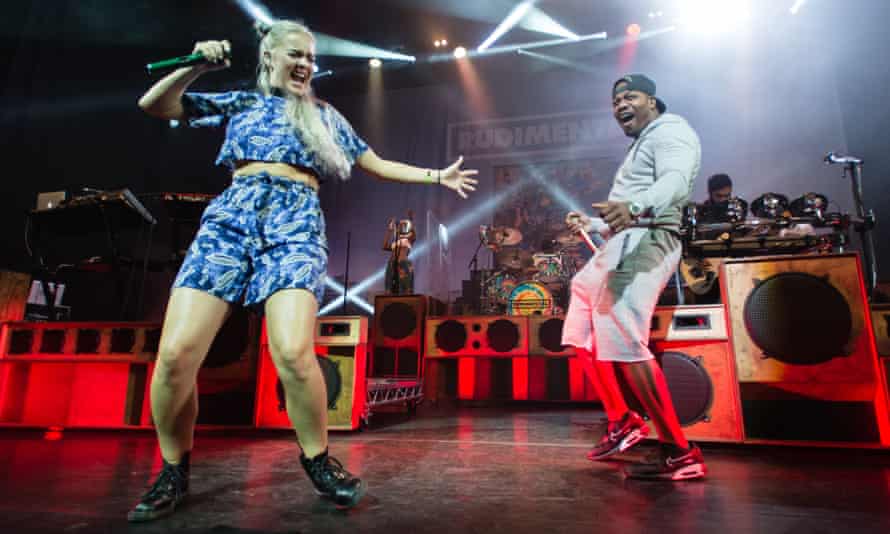 Anne-Marie on stage with Rudimental