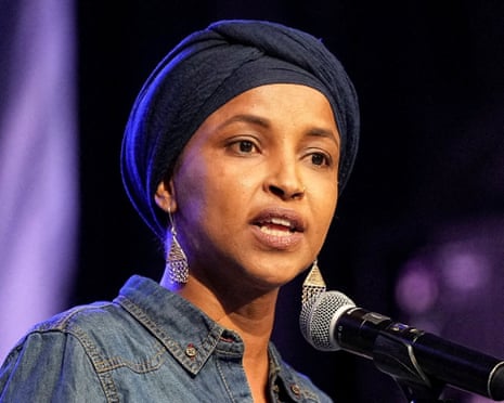 Woman speaks into microphone