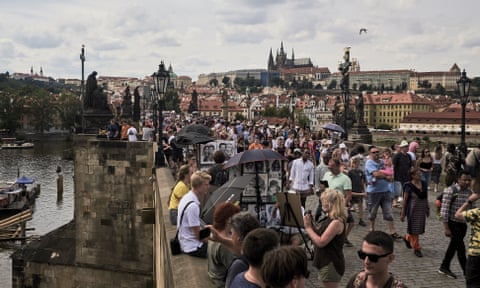 Tourists on Prague’s Charles Bridge this summer. The city is now Europe’s fifth most visited destination