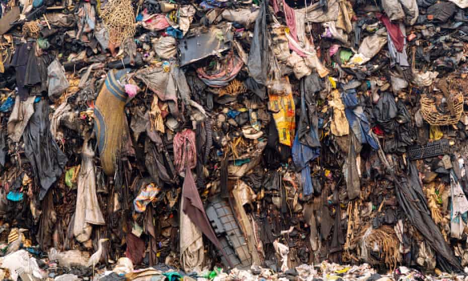 Unsellable secondhand clothes rot on a dumpsite in Accra, Ghana. 