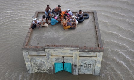 A family takes refuge in the aftermath of floods in Pakistan’s Punjab province.