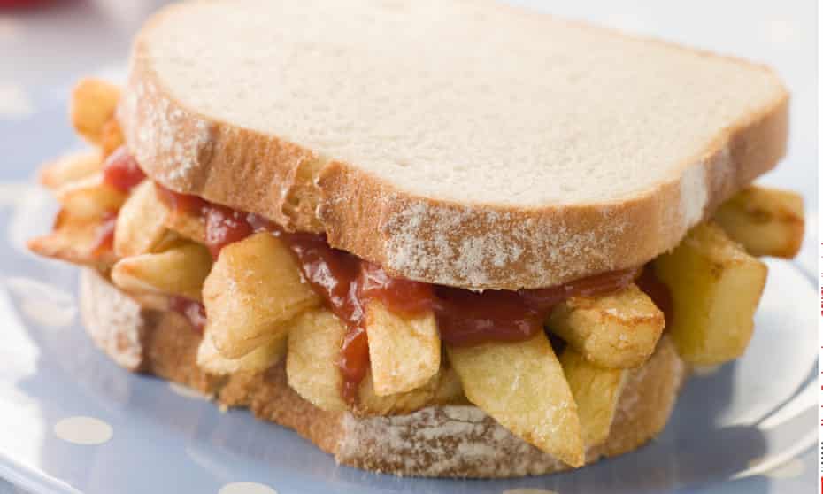 A chip butty made with white sliced bread.