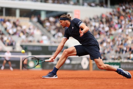 Alexander Zverev of Germany plays a backhand against Jakub Mensik