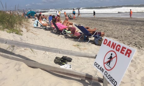 Tropical cyclone Hermine storm whips up waves and winds along east