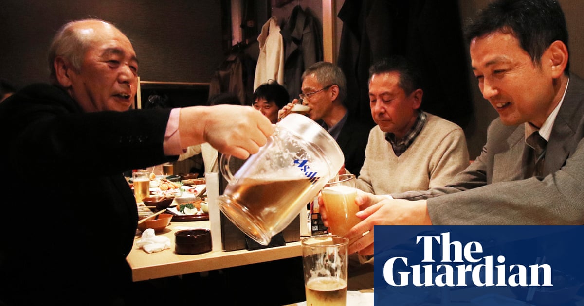 'Utter torment': Japan's party season loses lustre as workers dread drinking with the boss | Japan | The Guardian