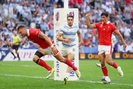 Dan Biggar scores a try for Wales.