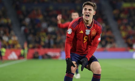 Gavi reacts after injuring his right knee during Spain’s win against Georgia.