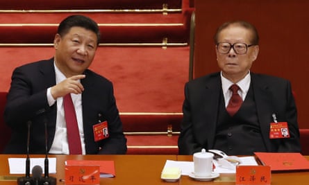 Chinese president Xi Jinping, left, chats with Jiang Zemin in 2017.