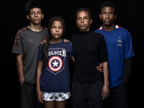 Raquel Fontoura with her children Kelvin, Lourdes Angelina and Kaua. They lost their home in the devastating floods that hit the region of Porto Alegre in Brazil at the end of April 2024.